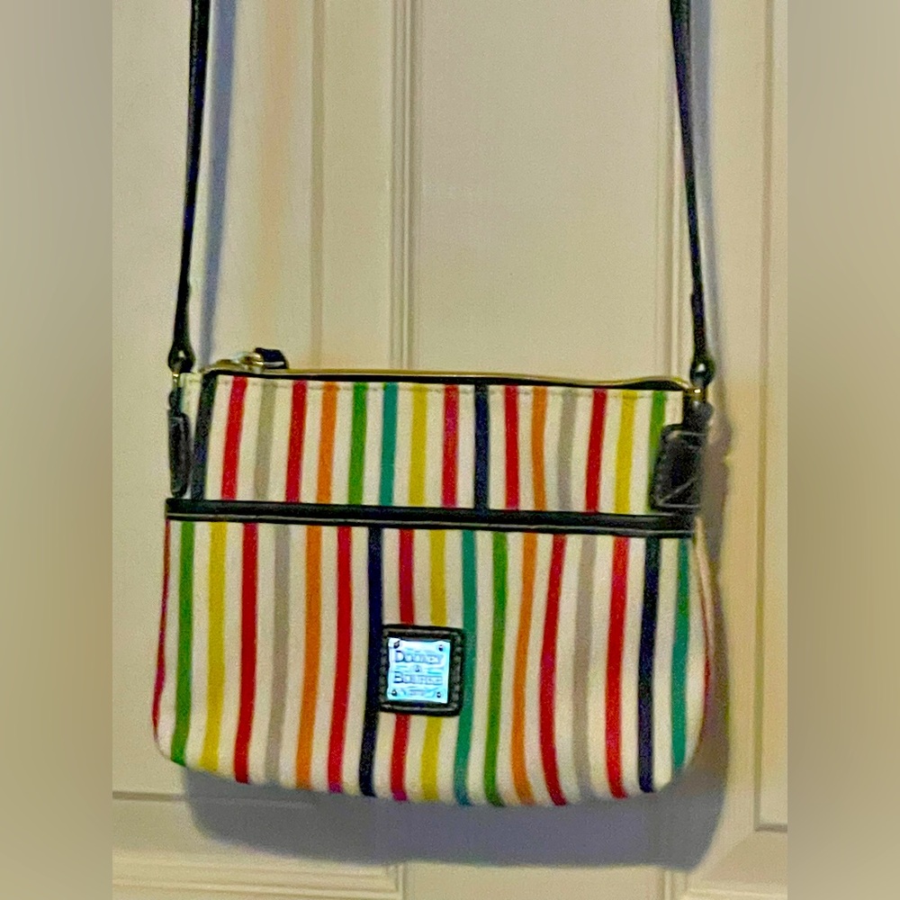 Dooney & Bourke ginger pouchette crossbody. Like new condition.